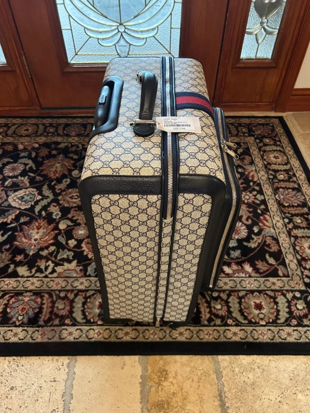Gucci Savoy GG Supreme Suitcase. Made in Italy.